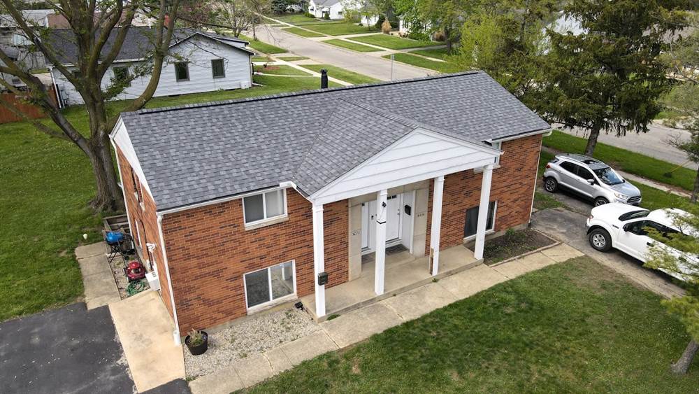 Commercial building roof serviced by Professional Roofing Contractors