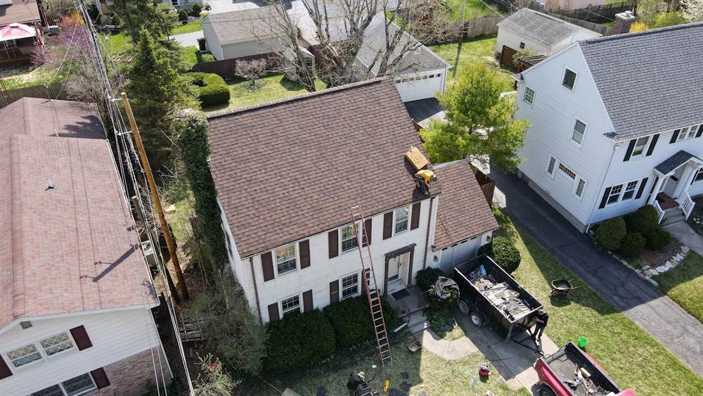 Worker on the roof during a Central Ohio roof replacement